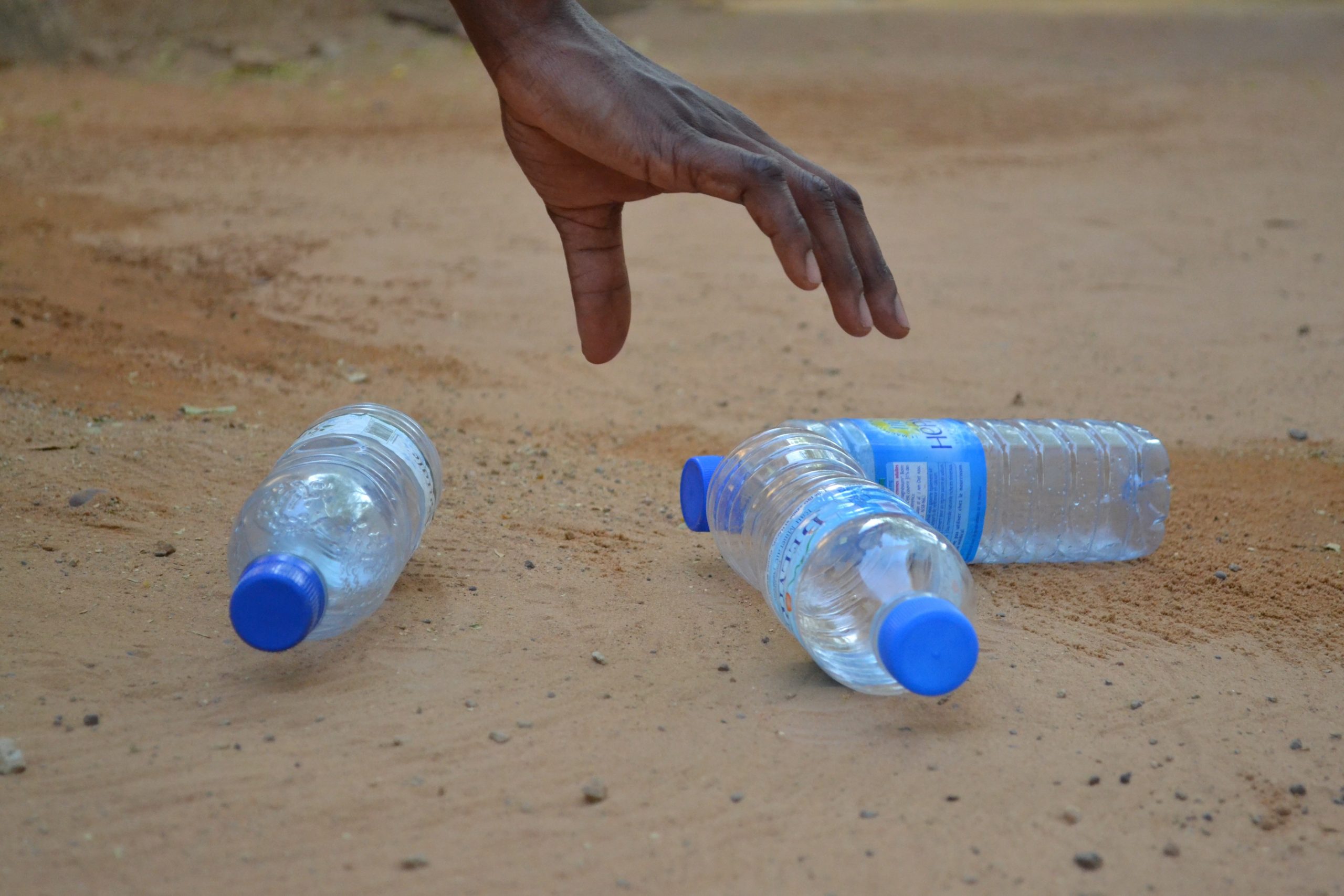 plastic water bottles_picking up_beach